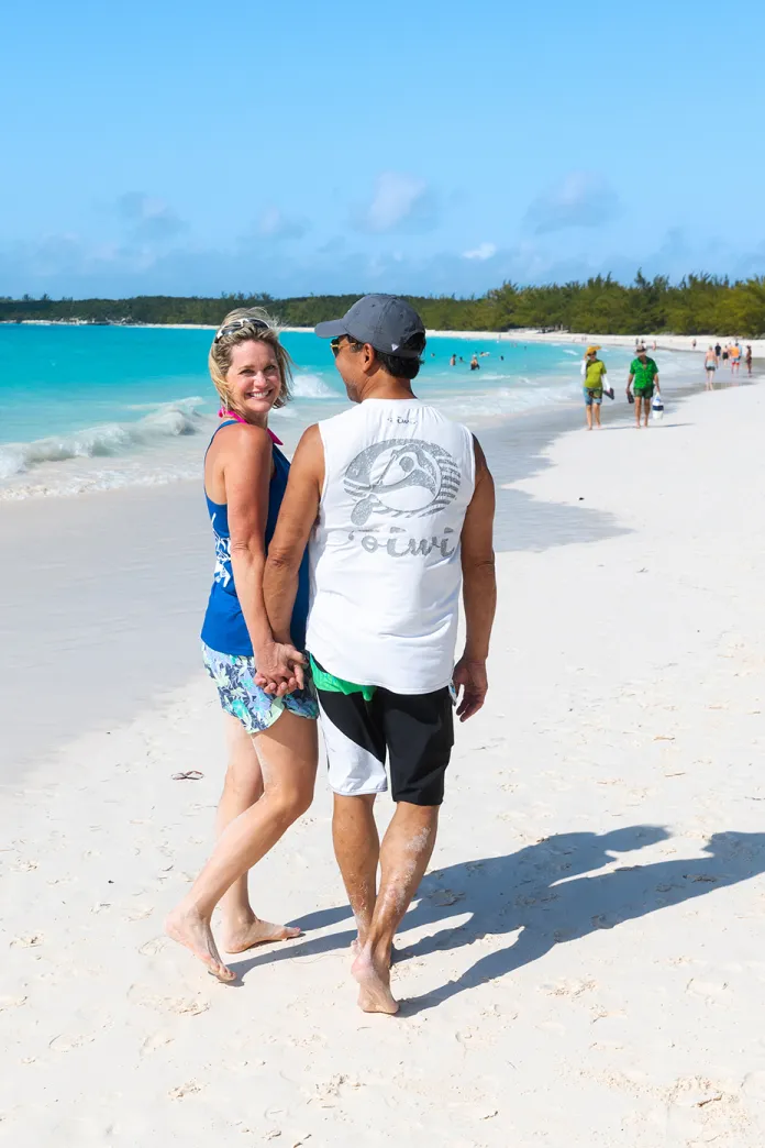 Couple walking along a beach