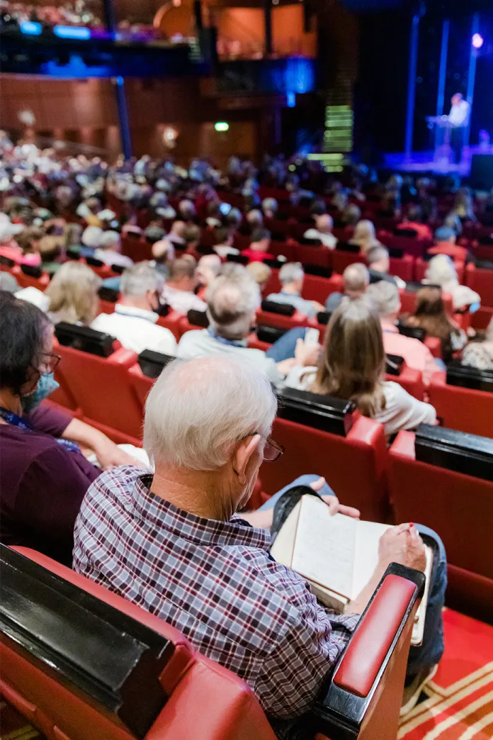 People sitting in an auditorium