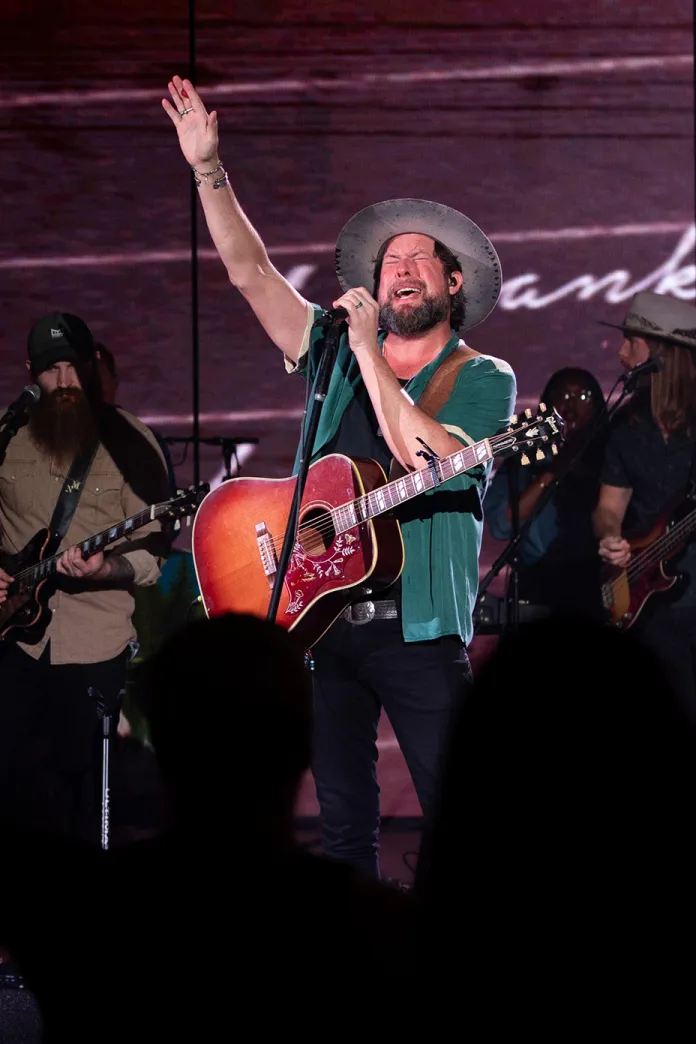 Zach Williams singing on stage