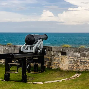 Old cannon pointed out toward the ocean